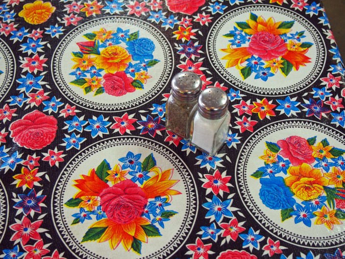 Black oil cloth with floral circles